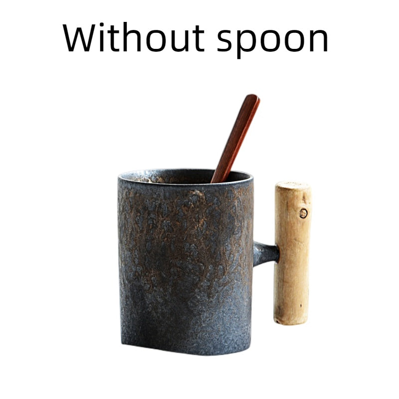 Handmade coarse pottery mug with spoon