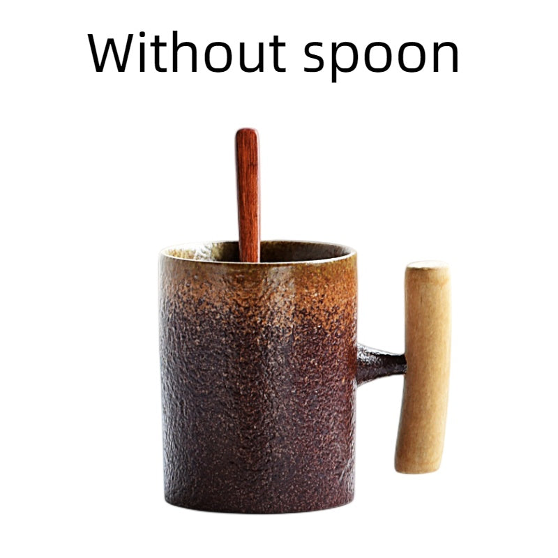 Handmade coarse pottery mug with spoon