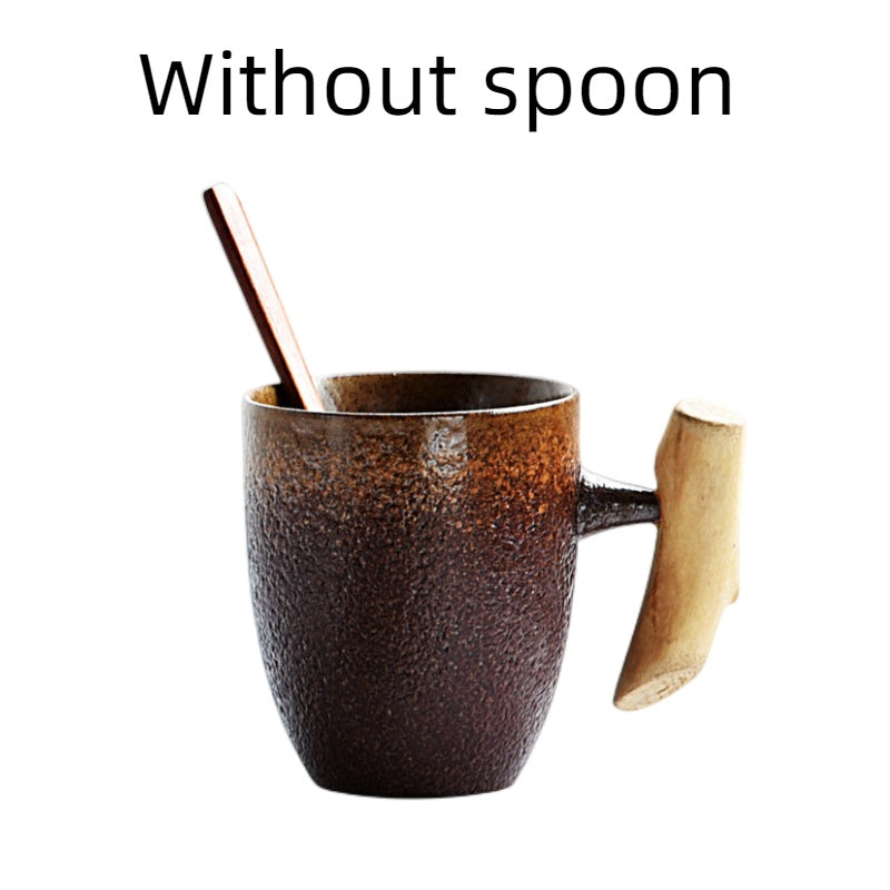 Handmade coarse pottery mug with spoon