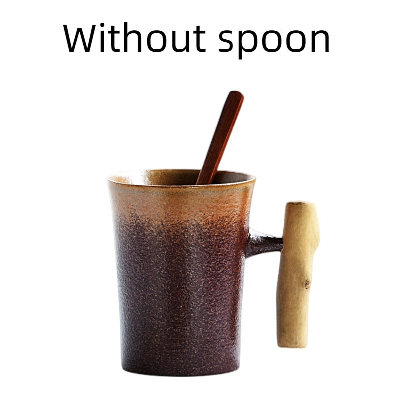 Handmade coarse pottery mug with spoon
