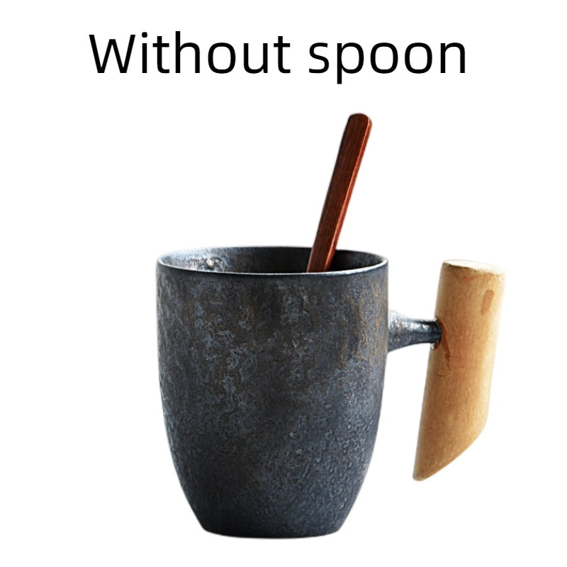 Handmade coarse pottery mug with spoon